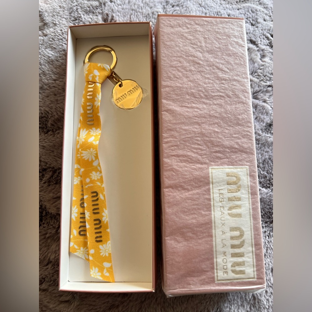NIB Miu Miu Yellow Floral Ribbon Beauty Keychain/Bagcharm